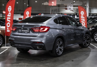 Подержанный автомобиль BMW X6 2017 года (7 фото)
