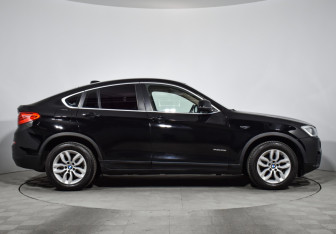 Подержанный автомобиль BMW X4 2015 года (4 фото)