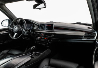 Подержанный автомобиль BMW X5 2016 года (10 фото)