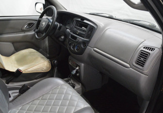 Подержанный автомобиль Mazda Tribute 2001 года (12 фото)