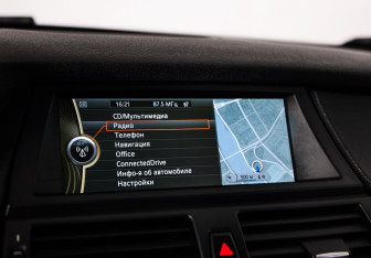 Подержанный автомобиль BMW X6 2014 года (13 фото)