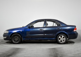 Подержанный автомобиль Nissan Almera Classic 2007 года (8 фото)