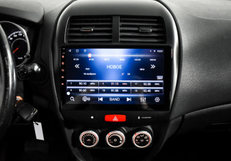 Подержанный автомобиль Mitsubishi ASX 2011 года (16 фото)