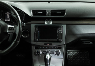 Подержанный автомобиль Volkswagen Passat CC 2013 года (14 фото)