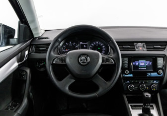 Подержанный автомобиль Skoda Octavia Liftback 2014 года (11 фото)