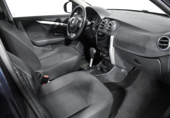 Подержанный автомобиль Nissan Almera Sedan 2013 года (12 фото)