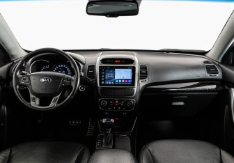 Подержанный автомобиль Kia Sorento 2014 года (10 фото)