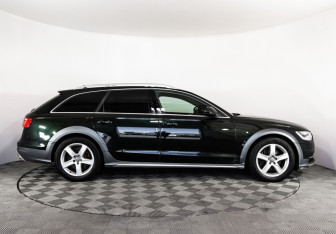 Подержанный автомобиль Audi A6 allroad 2013 года (4 фото)