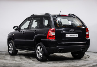 Подержанный автомобиль Kia Sportage 2009 года (7 фото)