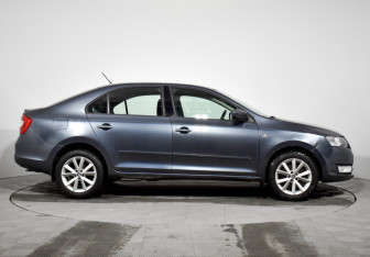 Подержанный автомобиль Skoda Rapid Liftback 2015 года (4 фото)