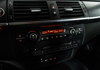 Подержанный автомобиль BMW X6 2014 года (18 фото)