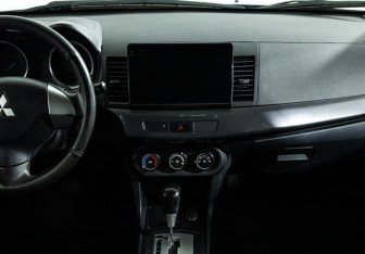 Подержанный автомобиль Mitsubishi Lancer Sedan 2012 года (14 фото)