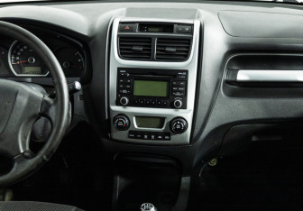 Подержанный автомобиль Kia Sportage 2010 года (14 фото)