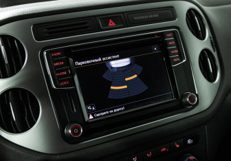 Подержанный автомобиль Volkswagen Tiguan 2015 года (15 фото)