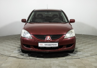Подержанный автомобиль Mitsubishi Lancer Sedan 2005 года (2 фото)