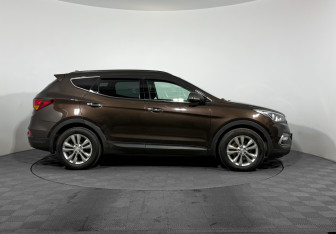 Подержанный автомобиль Hyundai Santa Fe 2016 года (4 фото)
