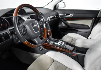 Подержанный автомобиль Audi A6 allroad 2010 года (9 фото)