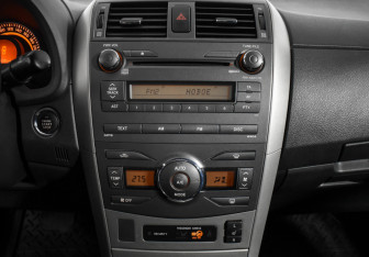 Подержанный автомобиль Toyota Corolla Sedan 2007 года (17 фото)