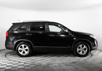 Подержанный автомобиль Kia Sorento 2015 года (4 фото)