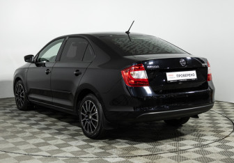 Подержанный автомобиль Skoda Rapid Liftback 2015 года (7 фото)