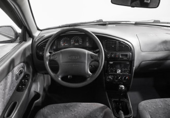 Подержанный автомобиль Kia Spectra Sedan 2007 года (10 фото)