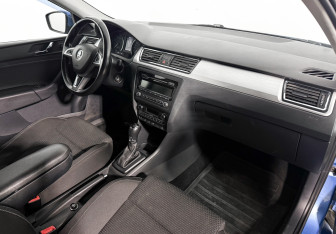 Подержанный автомобиль Skoda Rapid Liftback 2014 года (13 фото)