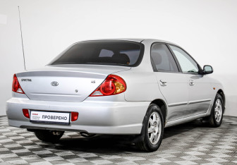 Подержанный автомобиль Kia Spectra Sedan 2009 года (5 фото)