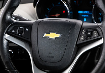 Подержанный автомобиль Chevrolet Cruze Hatchback 2014 года (11 фото)