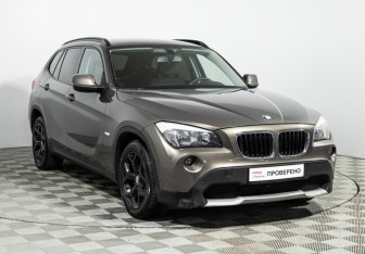 Подержанный автомобиль BMW X1 2011 года (3 фото)