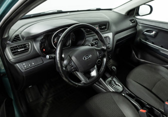 Подержанный автомобиль Kia Rio Sedan 2014 года (11 фото)