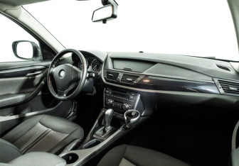 Подержанный автомобиль BMW X1 2011 года (9 фото)