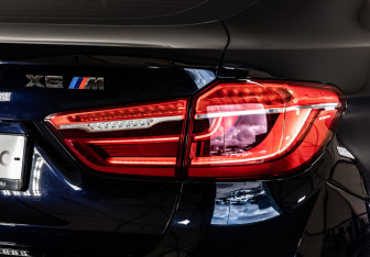 Подержанный автомобиль BMW X6 2015 года (11 фото)