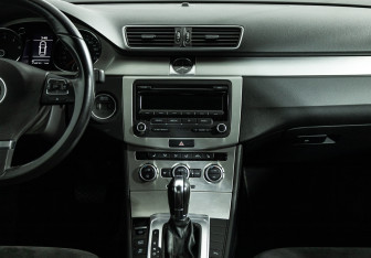 Подержанный автомобиль Volkswagen Passat Sedan 2012 года (13 фото)