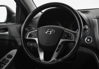 Подержанный автомобиль Hyundai Solaris Sedan 2014 года (14 фото)