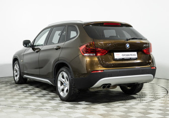 Подержанный автомобиль BMW X1 2012 года (7 фото)