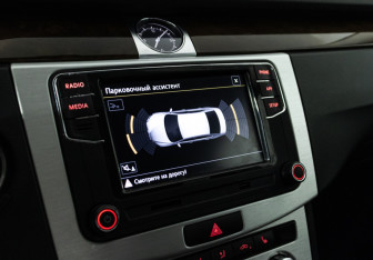 Подержанный автомобиль Volkswagen Passat Sedan 2011 года (15 фото)