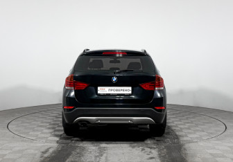 Подержанный автомобиль BMW X1 2014 года (6 фото)