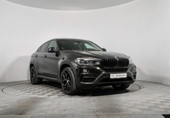 Подержанный автомобиль BMW X6 2015 года (3 фото)