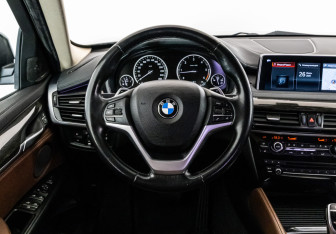 Подержанный автомобиль BMW X6 2017 года (15 фото)