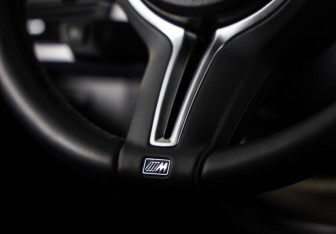 Подержанный автомобиль BMW X5 2010 года (12 фото)