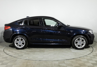 Подержанный автомобиль BMW X4 2015 года (4 фото)