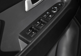 Подержанный автомобиль Kia Sportage 2013 года (10 фото)