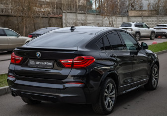 Подержанный автомобиль BMW X4 2015 года (5 фото)