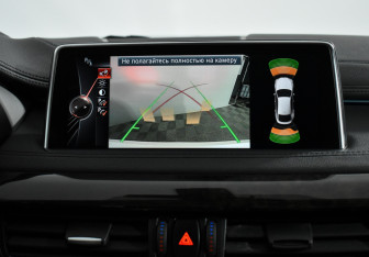 Подержанный автомобиль BMW X6 2016 года (18 фото)