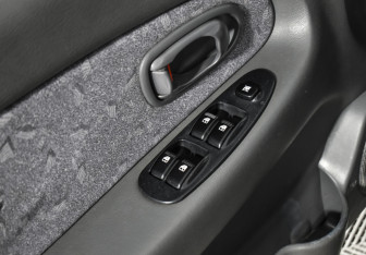 Подержанный автомобиль Kia Spectra Sedan 2007 года (10 фото)