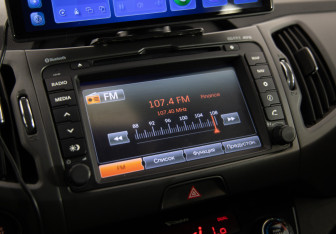 Подержанный автомобиль Kia Sportage 2011 года (17 фото)