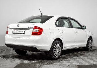 Подержанный автомобиль Skoda Rapid Liftback 2014 года (5 фото)