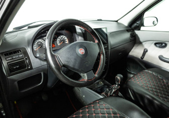Подержанный автомобиль Fiat Albea 2011 года (11 фото)