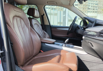 Подержанный автомобиль BMW X5 2014 года (13 фото)