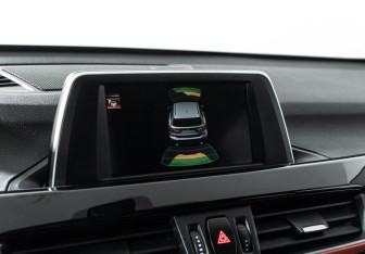 Подержанный автомобиль BMW X1 2016 года (15 фото)